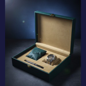 Green box with premium watch and pen with wallet