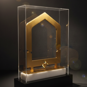 Golden metal engraved trophy inside the acrylic case and the base is also acrylic